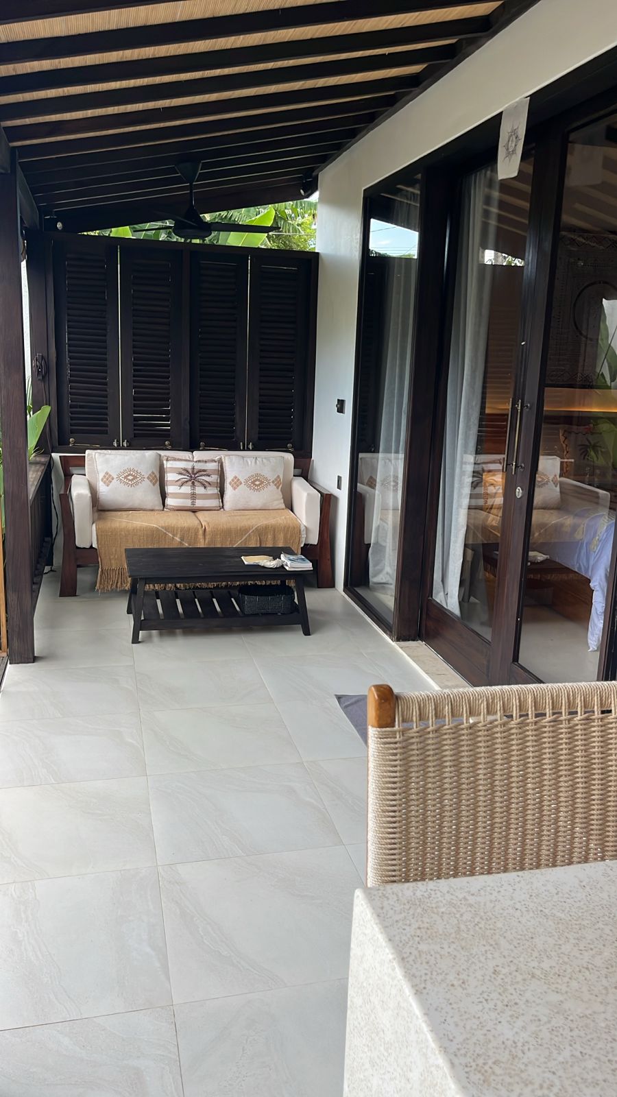 Covered terrace lounge with sofa